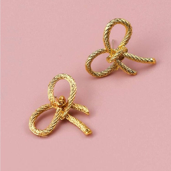Gold bow stud earrings - Picture 2 of 2